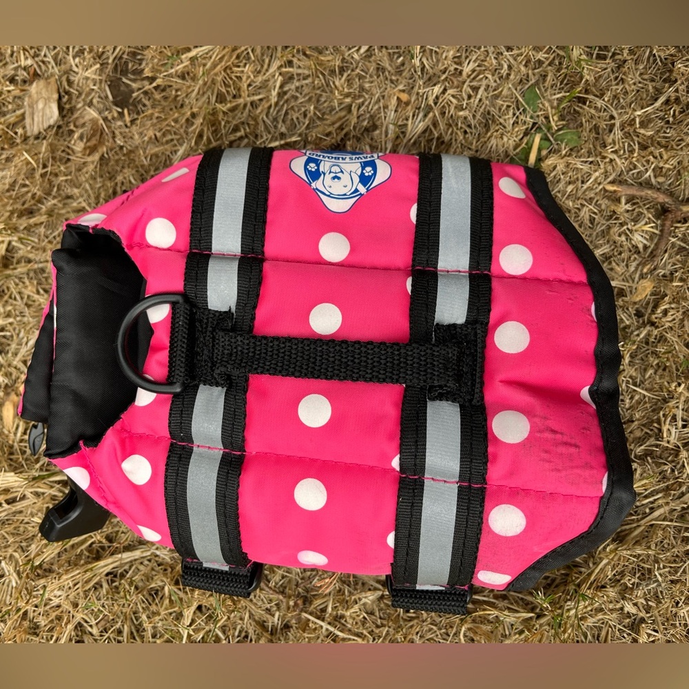 Extra extra small pink life jacket for a small pet